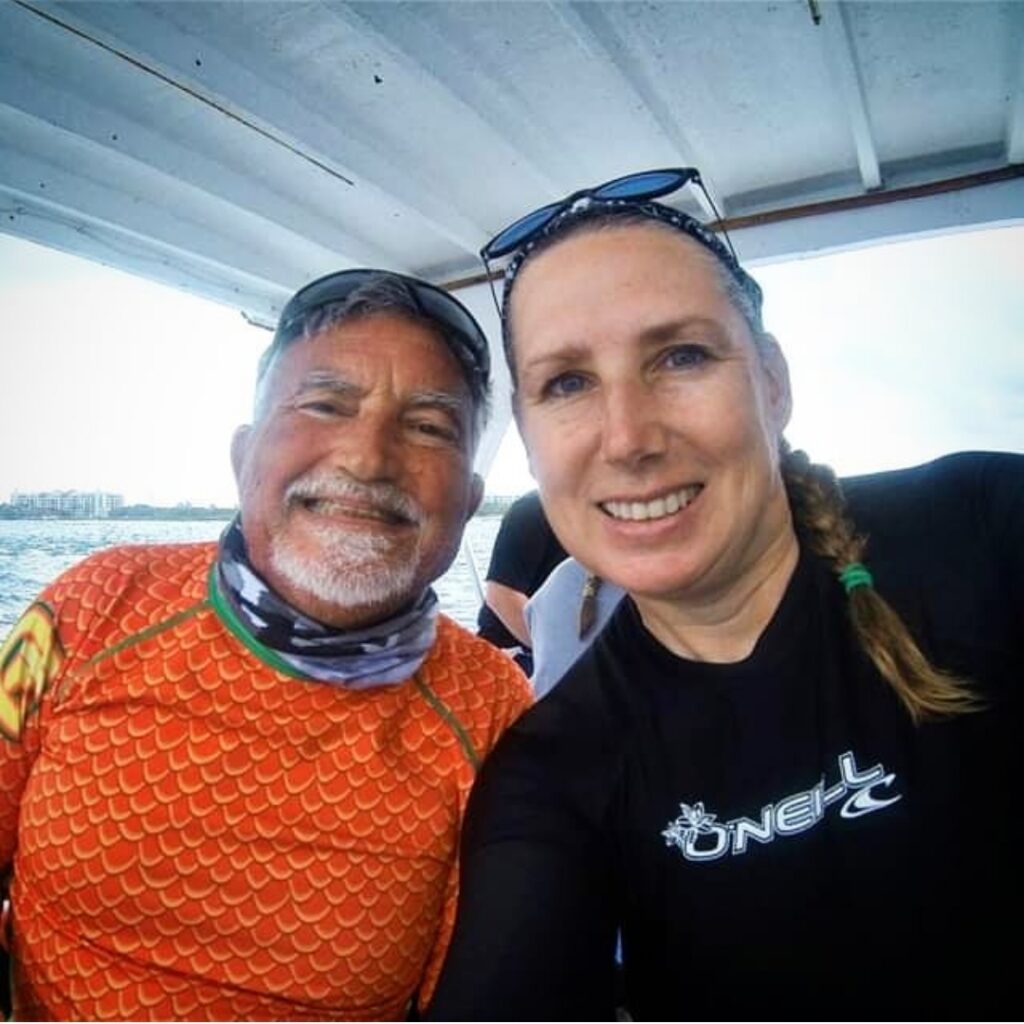 Chris and Amy on a dive boat